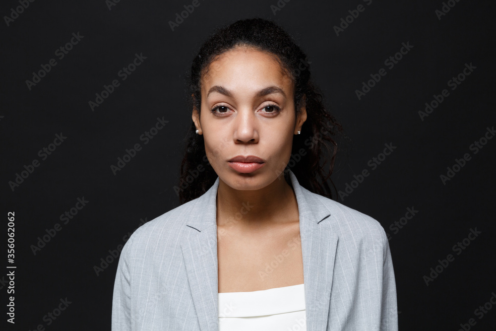 Beautiful young african american business woman in grey suit, white ...