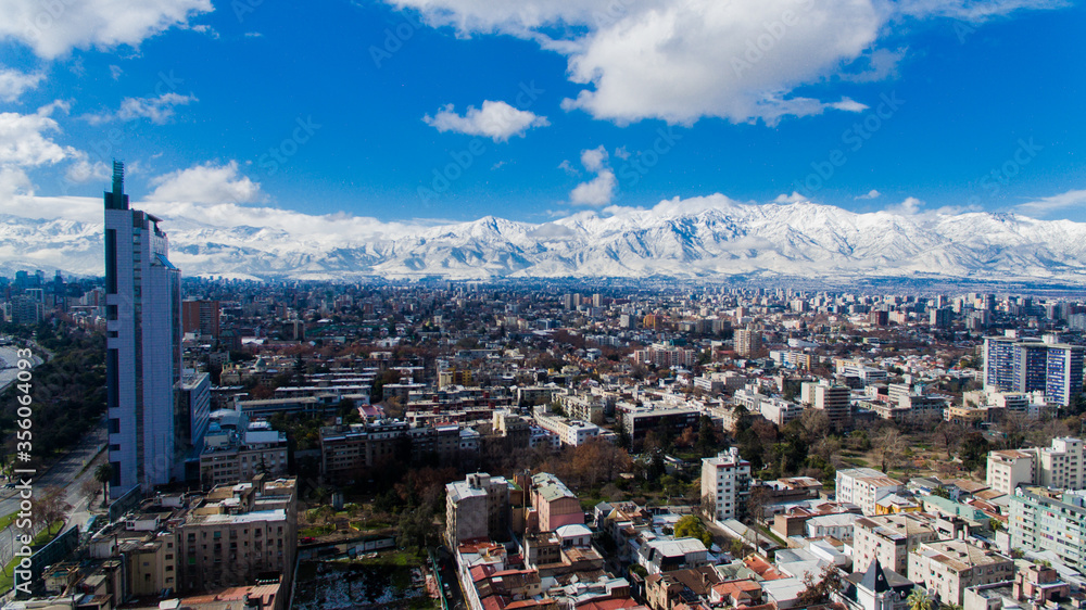 Santiago de Chile July 17/07/2017 Santiago de Chile aerial shot Baquedano square covered by snow with the background mountains behind and the Andes mountain range