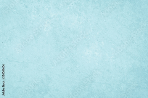 Pastel Blue and White concrete stone texture for background in summer wallpaper. Cement and sand wall of tone vintage. Concrete abstract wall of light cyan color, cement texture mint green for design.