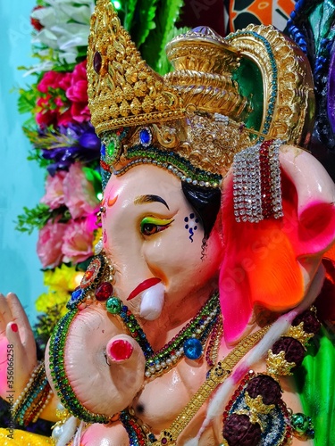 A colourful lord Ganesha statue with eco friendly decoration