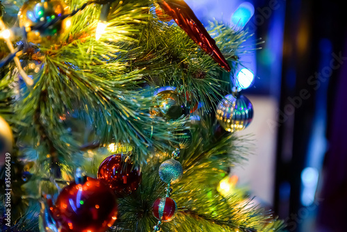 Christmas tree and Christmas decorations  Beautiful decorated christmas tree. Holiday background. Closeup