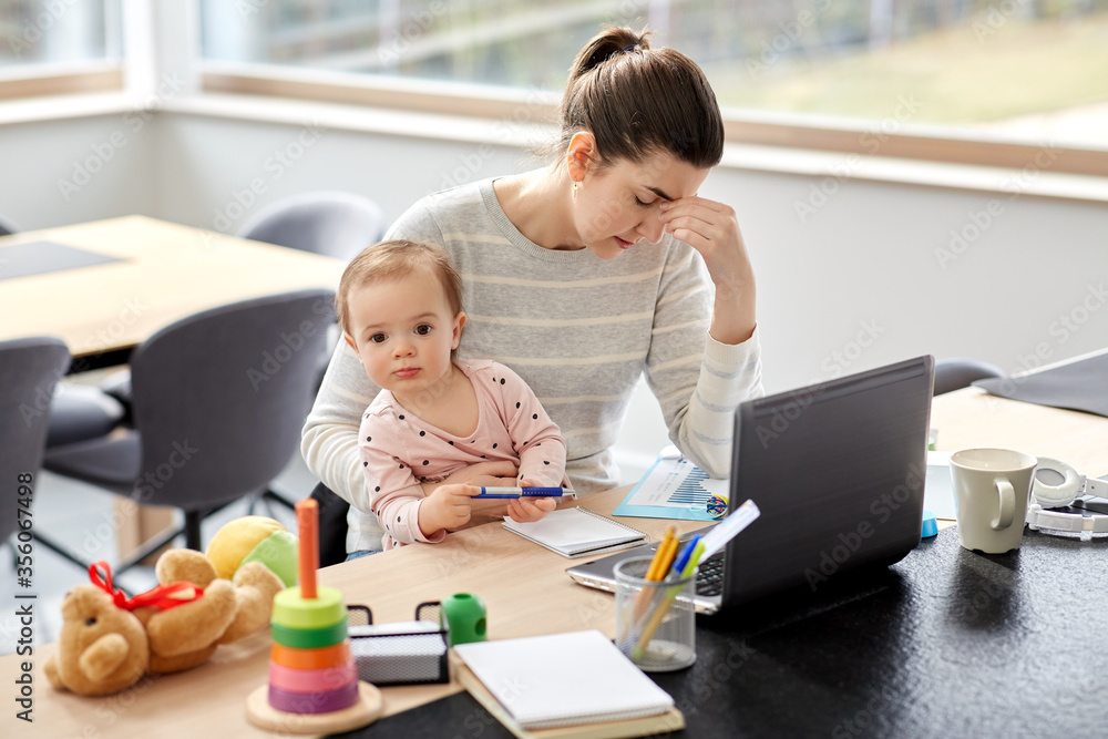 remote job, multi-tasking and family concept - tired mother with baby working at home office remote job, multi-tasking and family concept - tired mother with baby working at home office