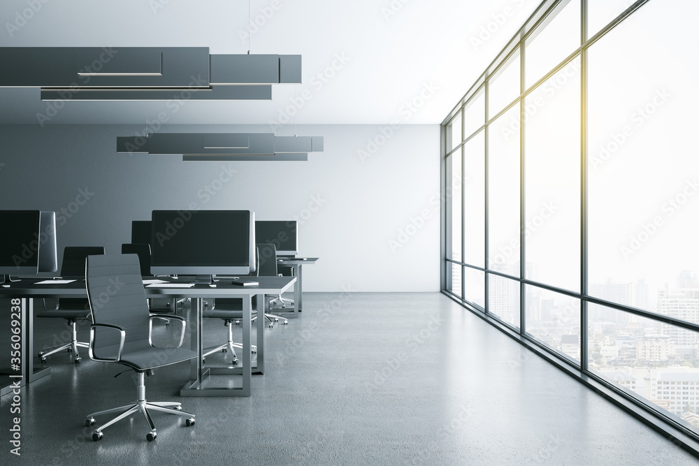 Luxury coworking office interior with computers Luxury coworking office interior with computers