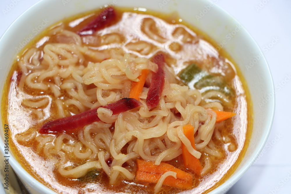 Noodle with vegetables in white bowl, Spicy noodle soup. Still life Noodle with vegetables in white bowl, Spicy noodle soup. Still life