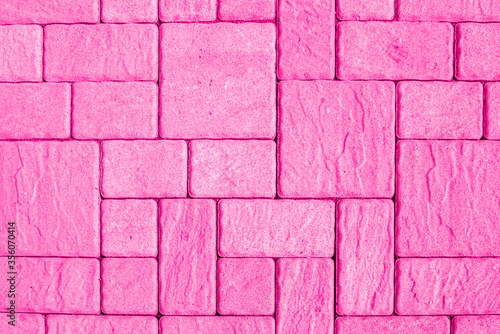 Pink street pavement pattern from directly above