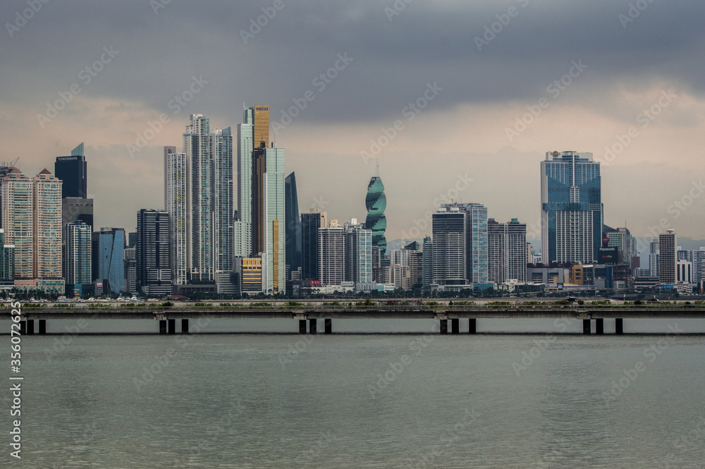 Fototapeta premium Construction boom in Panama City. Skyline of Panama City on a cloudy day with modern buildings. View from Cinta Costera