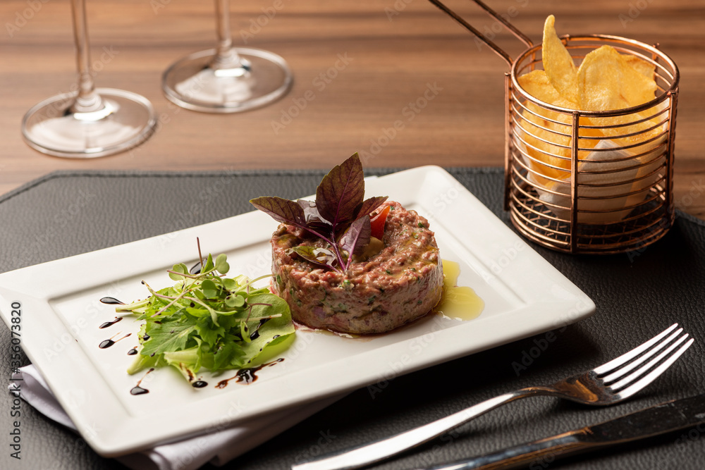 steak tartare shredded beef with spices and chips fries steak tartare shredded beef with spices and chips fries
