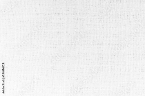 White natural linen fabric texture background. Grey silk satin cloth. © Manitchaya