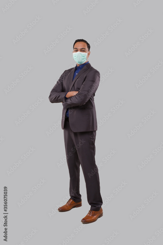 Businessman Hands Crossed Wearing Medical Mask Isolated. Indian Businessman Standing Full Length Businessman Hands Crossed Wearing Medical Mask Isolated. Indian Businessman Standing Full Length