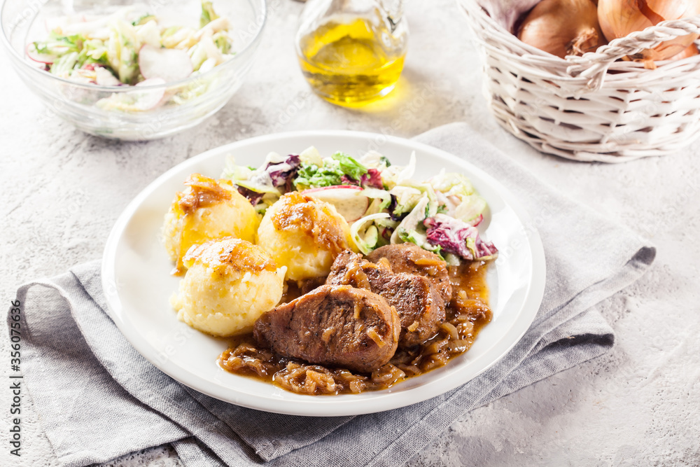 Braised pork loins with onion sauce Braised pork loins with onion sauce