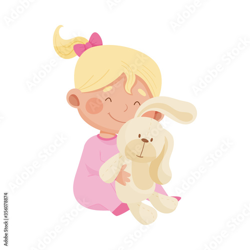 Baby Girl Sitting on the Floor and Hugging Fluffy Toy Hare Vector Illustration