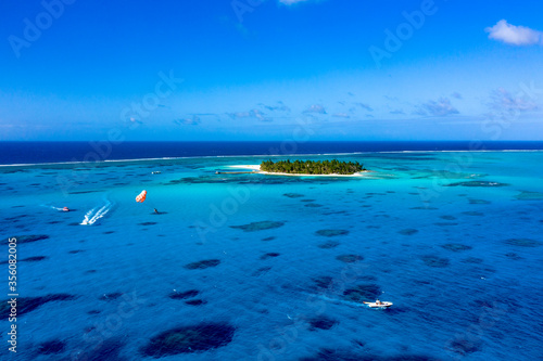 南の島のリゾート空撮 サンゴ礁に囲まれた無人島 サイパン・マニャガハ島