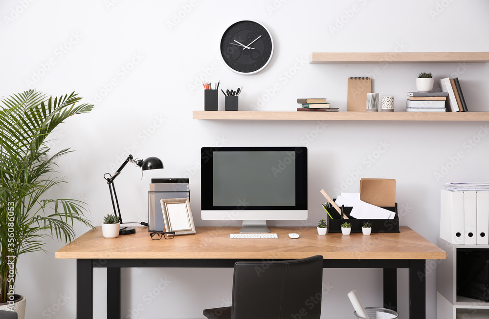 Modern computer on table in office interior. Stylish workplace Modern computer on table in office interior. Stylish workplace