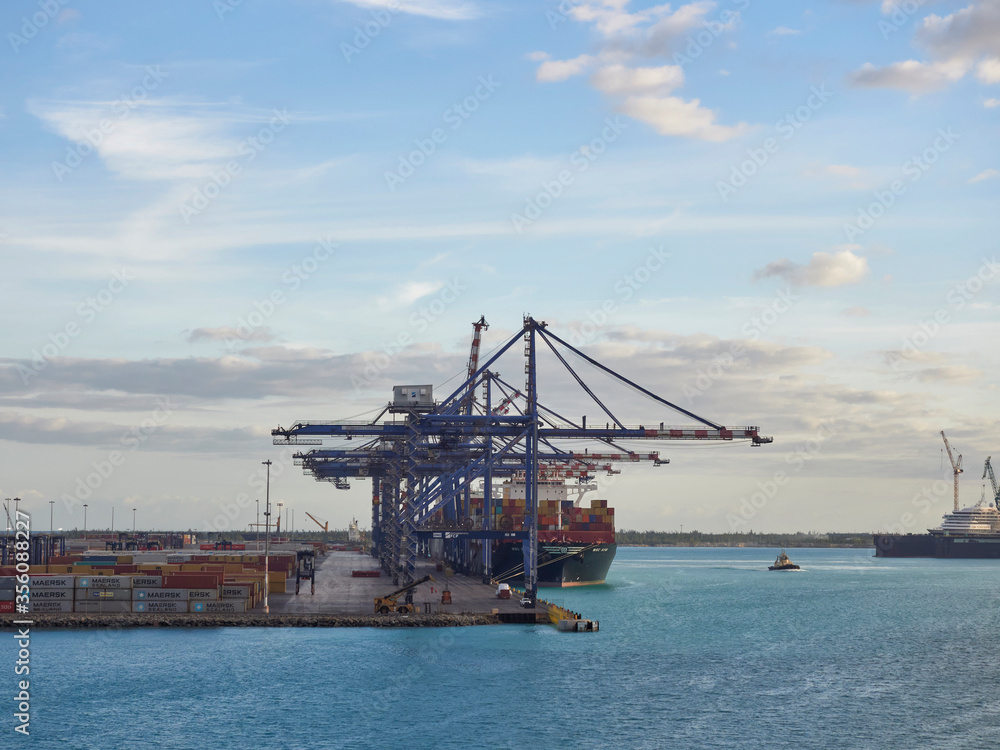 The Container Terminal at Freeport in the Bahamas, with a Container shipped berthed alongside on one early November Morning.