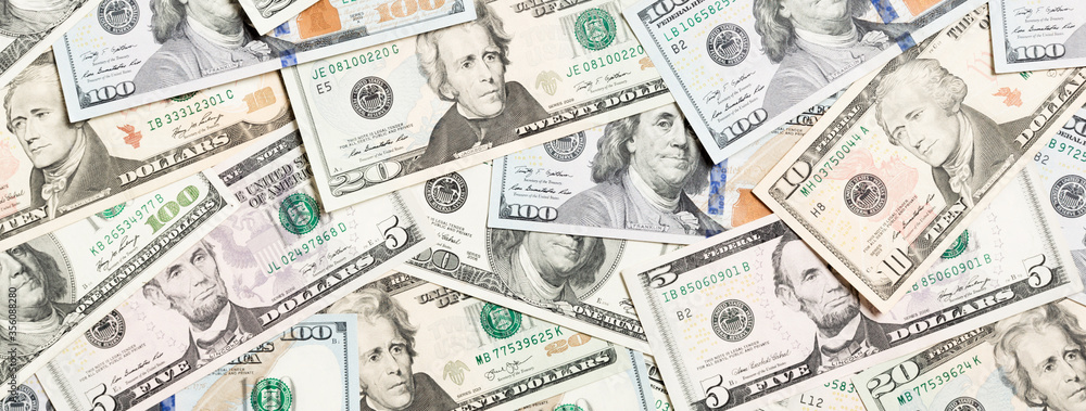 Top view of various dollar cash background. Different banknotes concept. Wealth and rich concept Top view of various dollar cash background. Different banknotes concept. Wealth and rich concept