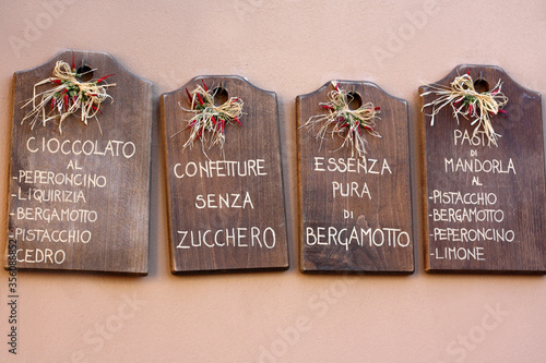 Traditional mediterranien decoration wooden plates in South Italy photo