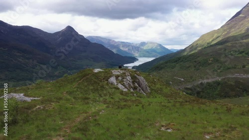aerial footage of loch leven and the pap of glencoe shot on the west highland way near kinlochleven in the argyll region of the highlands of scotland in summer