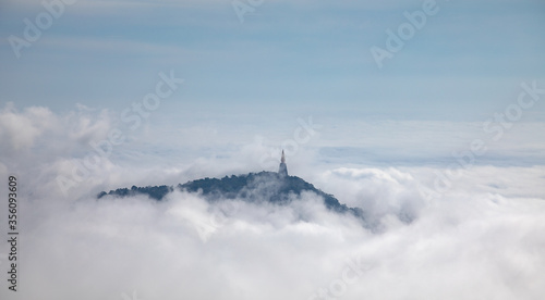 Fog, city, uphill