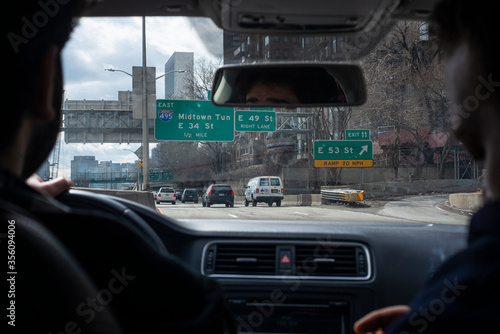 driving a car street sign navigating  photo