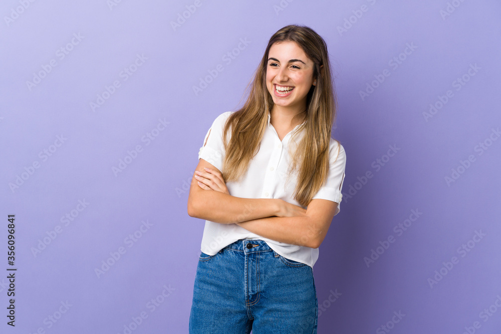 Young woman over isolated purple background happy and smiling Young woman over isolated purple background happy and smiling
