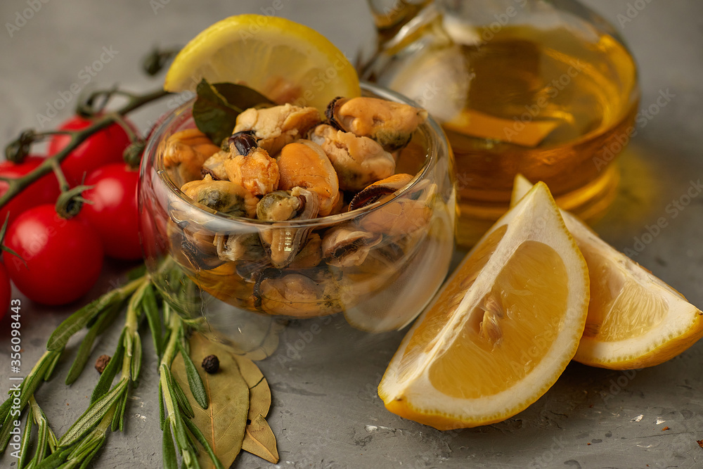 sea cocktail on a plate with lemon and rosemary