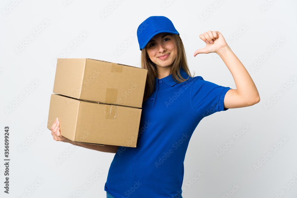 Young delivery woman over isolated white background proud and self-satisfied Young delivery woman over isolated white background proud and self-satisfied