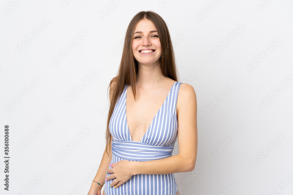 Young caucasian woman isolated on white background in swimsuit in summer holidays Young caucasian woman isolated on white background in swimsuit in summer holidays