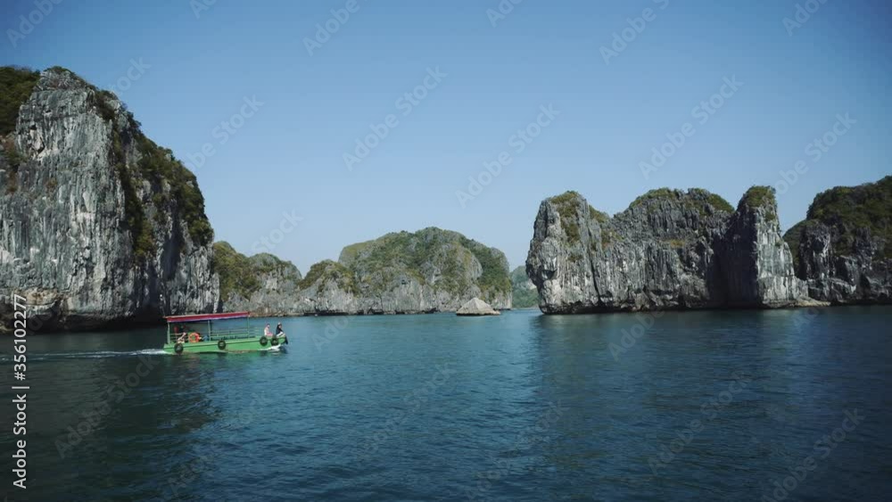 Tourist Cruise Ship Boat In Lagoon Halong Bay, Cat Ba Island Vietnam 4K Tourist Cruise Ship Boat In Lagoon Halong Bay, Cat Ba Island Vietnam 4K