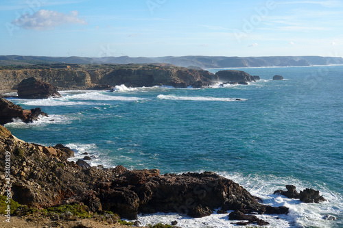 rocky cliff at typical beach at the west coast of Portugal 