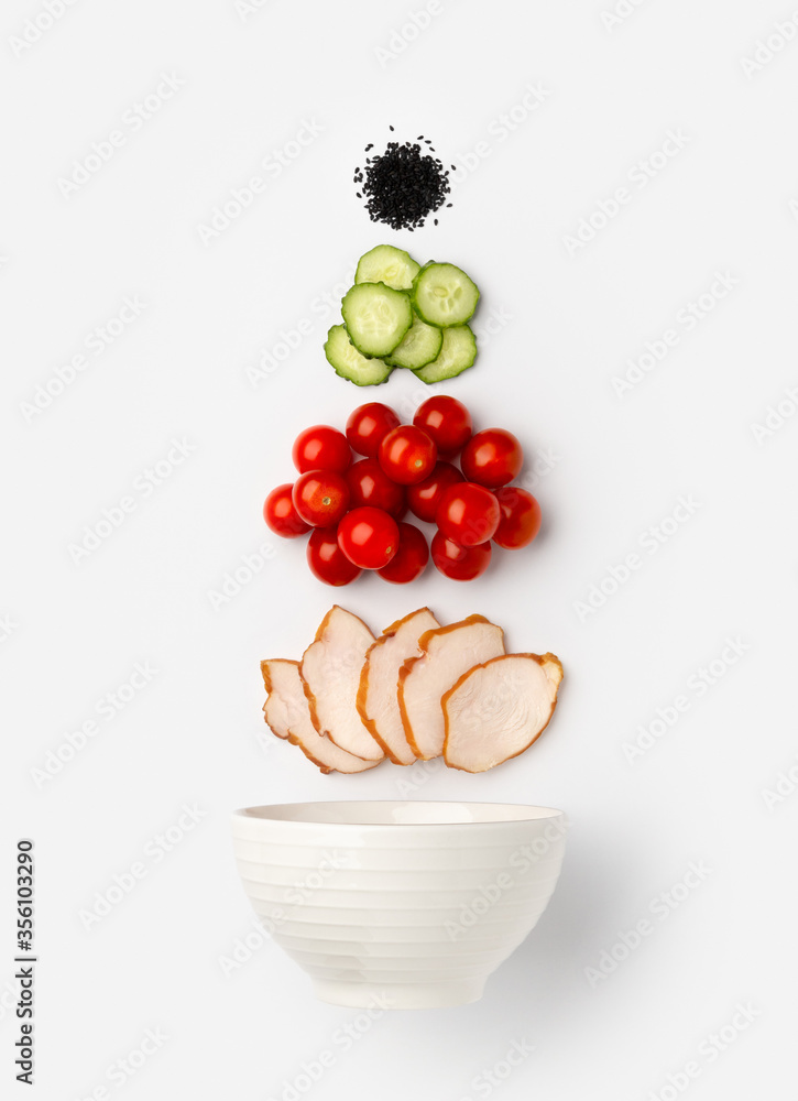 Creative composition with salad ingredients and ceramic bowl Creative composition with salad ingredients and ceramic bowl