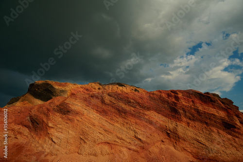 A canyon with a mountain in the background