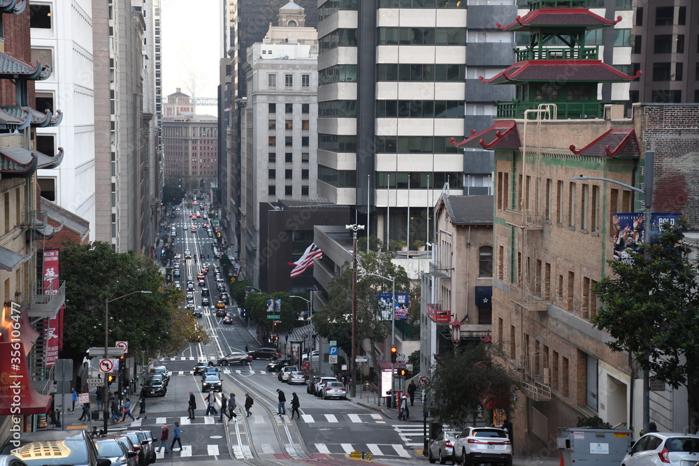 People drive in the steep streets of San Francisco, USA. San Francisco is the 4th most populous city in California 