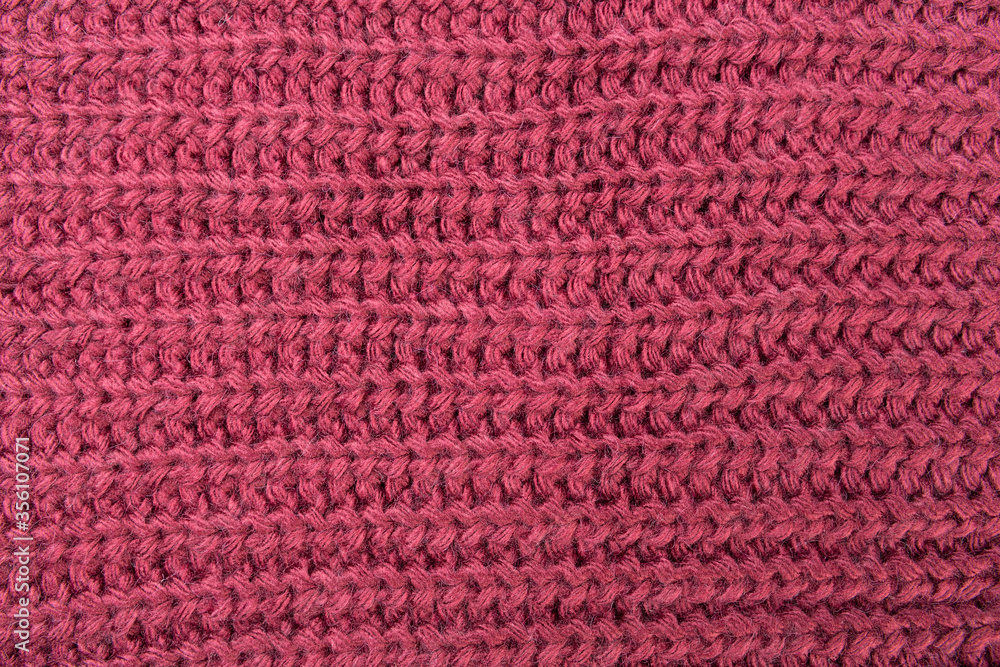 texture of woolen knitted fabric, burgundy color, machine knitting texture of woolen knitted fabric, burgundy color, machine knitting