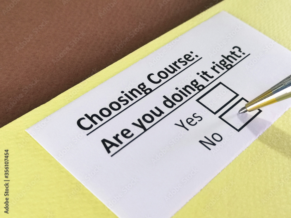One person is answering question about choosing course. One person is answering question about choosing course.
