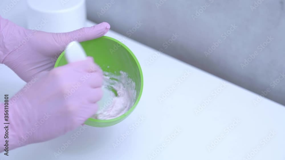 Close-up 4K video of woman enjoying face mask in professional salon Close-up 4K video of woman enjoying face mask in professional salon