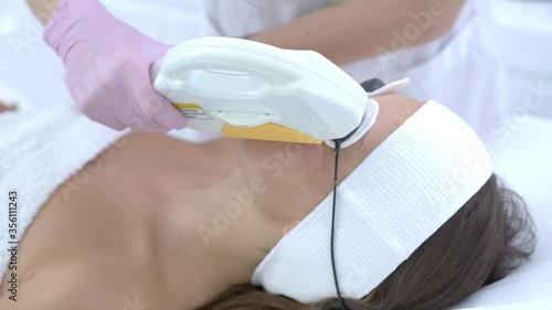 Close-up 4K video of woman enjoying beauty treatment in professional salon