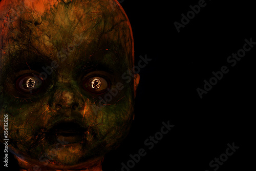 фотографія Creepy evil looking doll