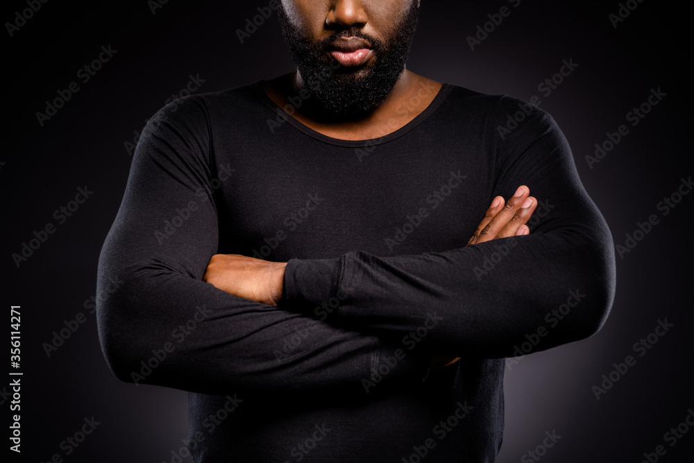 Cropped photo of serious afro american guy cross hands ready fight for human equality isolated over black color background