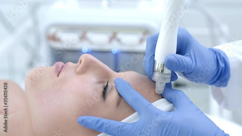 Close-up 4K video of woman enjoying beauty treatment in professional salon