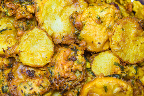 a famous south indian snack in a plate, potato masal fry, kerala photo