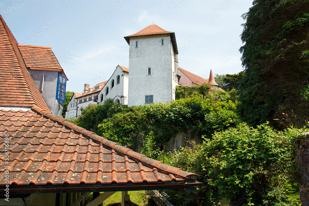 Caldey Abbey is an abbey and monastery of the Cistercian order of the Strict Observance (commonly called Trappists), situated on Caldey Island near Tenby, Pembrokeshire.