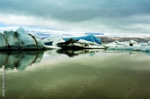 gold mirror of Jokulsarlon Glacier Lake, Iceland