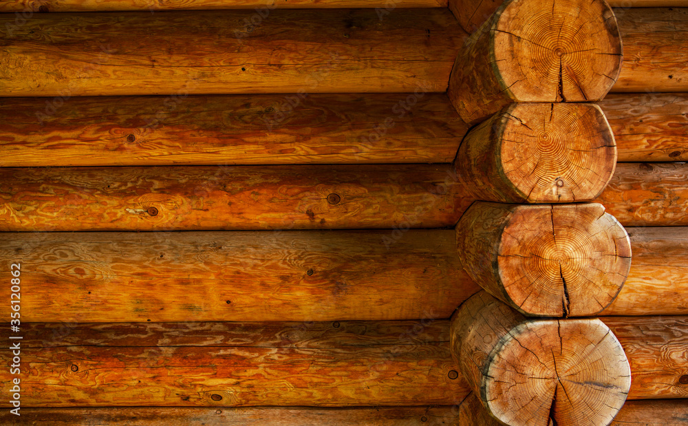 Close up of side-corner of log farmhouse. Close up of side-corner of log farmhouse.