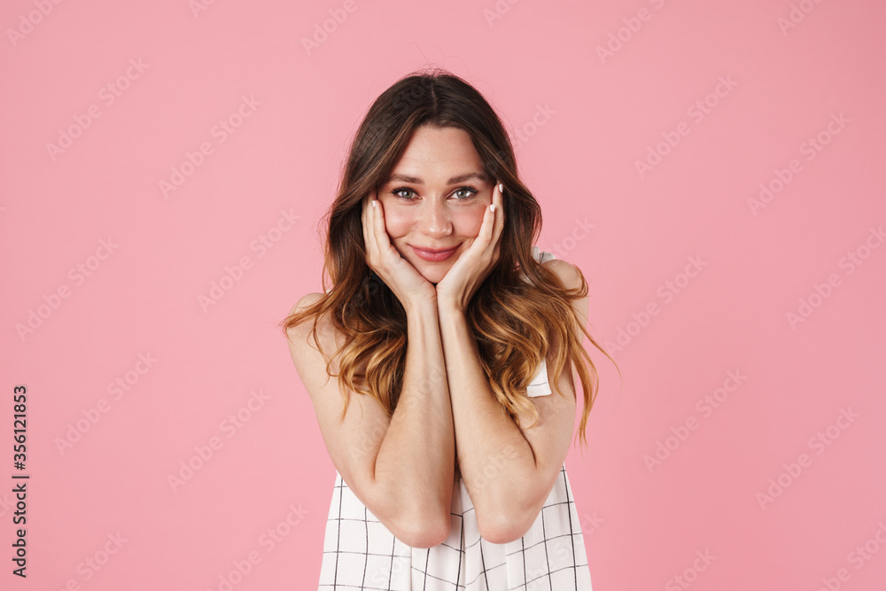 Image of happy beautiful woman smiling and looking at camera Image of happy beautiful woman smiling and looking at camera