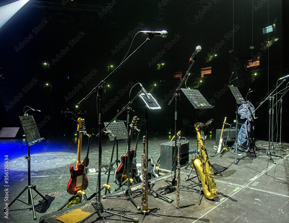 musical instruments, saxophone, guitar, on stage before the concert