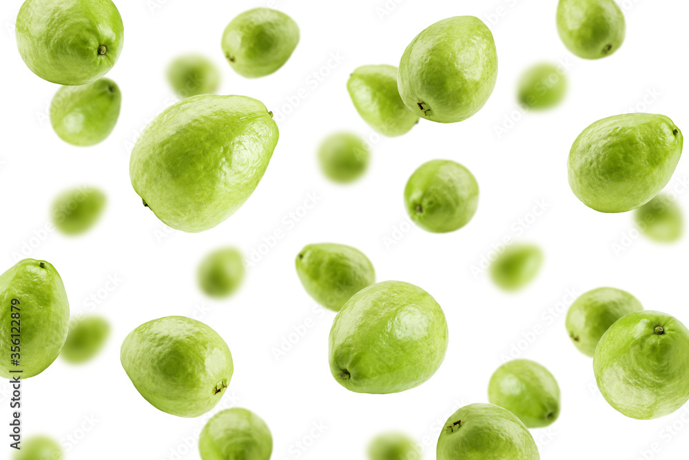 Falling guava isolated on white background, selective focus Falling guava isolated on white background, selective focus
