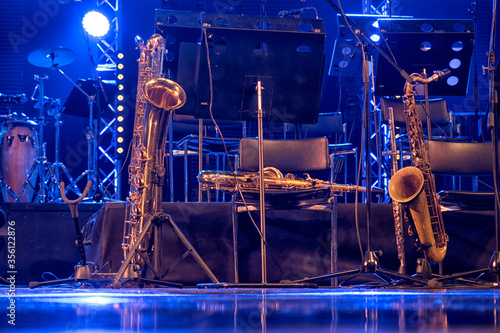 Photography musical instruments, saxophone, guitar, on stage before the concert