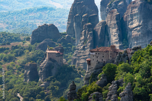 Great view of the monasteries of Meteora in Greece. Landscape with monasteries and rocks in the sunset photo