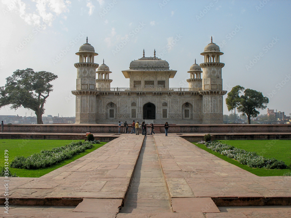 Fototapeta premium Agra, Uttar Pradesh, India-02/06/2007: a front view of Itimad-ud-daulah's Tomb with people