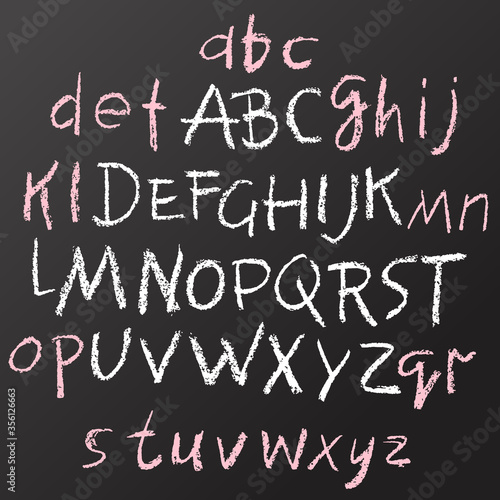 Handwritten vector chalked alphabet. Imitation texture of chalk. Modern hand drawn alphabet. Isolated letters.